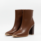 The Elegant Gold-Tip Ankle Boot